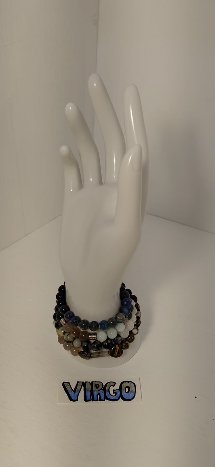 Virgo on wrist